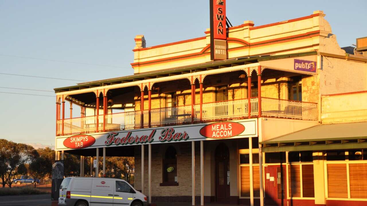 A pub with a van parked out the front
