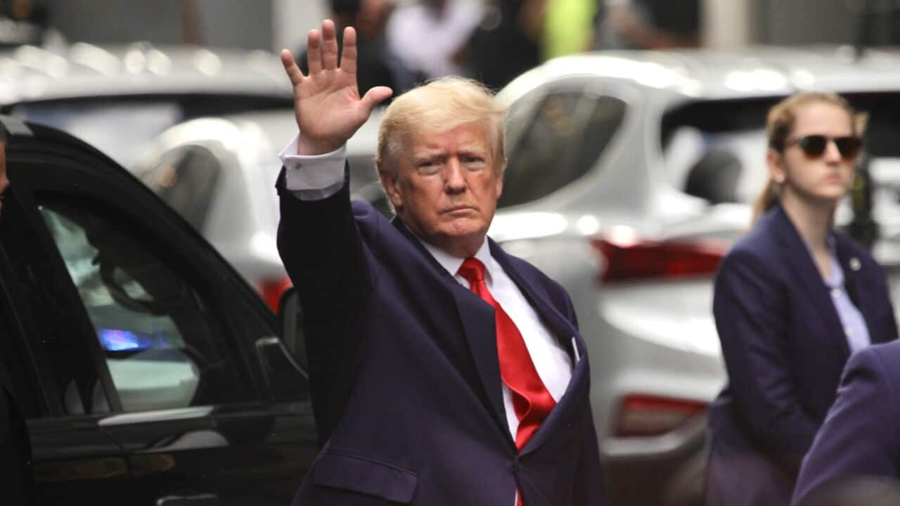 Donald Trump leaves Trump Tower