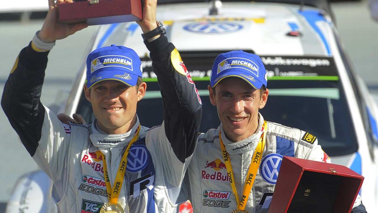 French rally driver Sebastien Ogier (L) and co-driver Julien Ingrassia