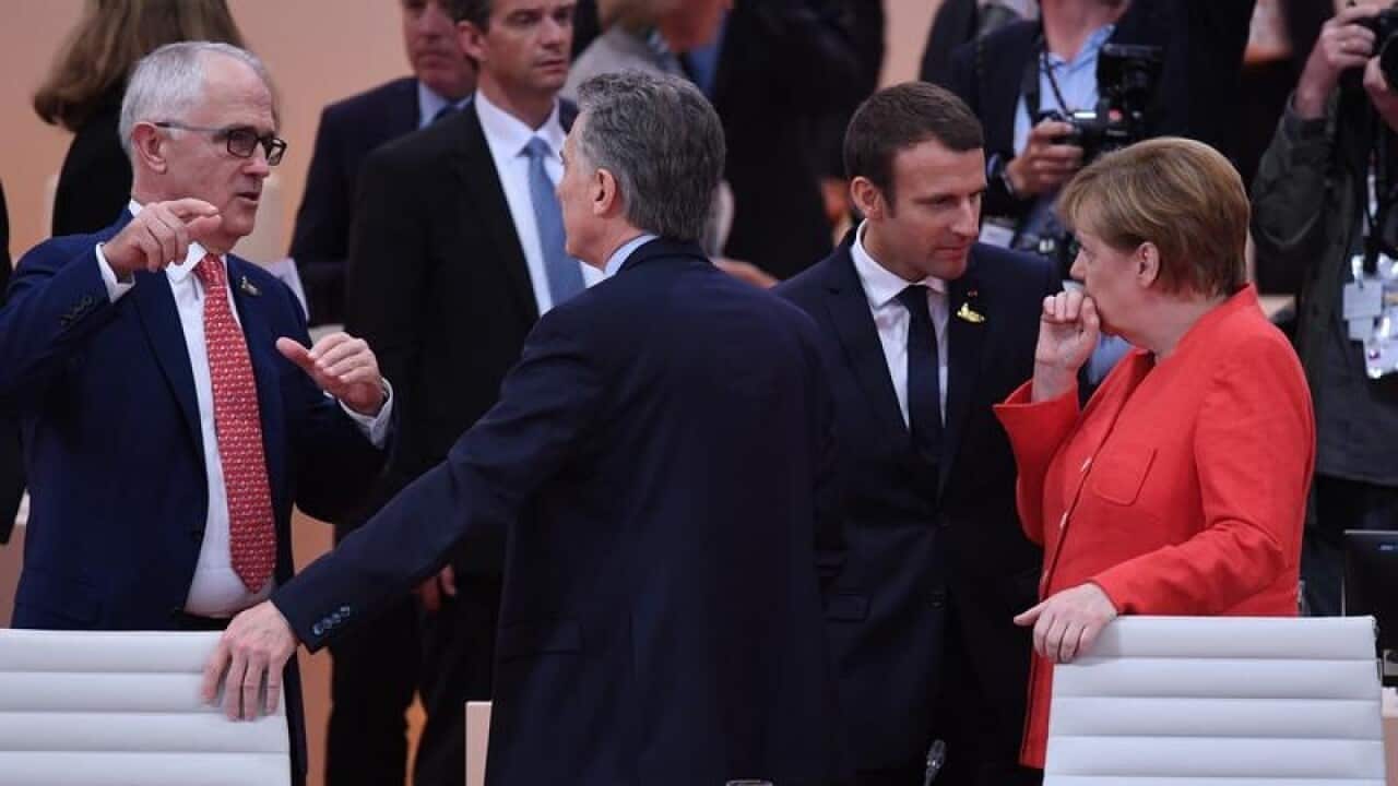 Malcolm Turnbull (left)