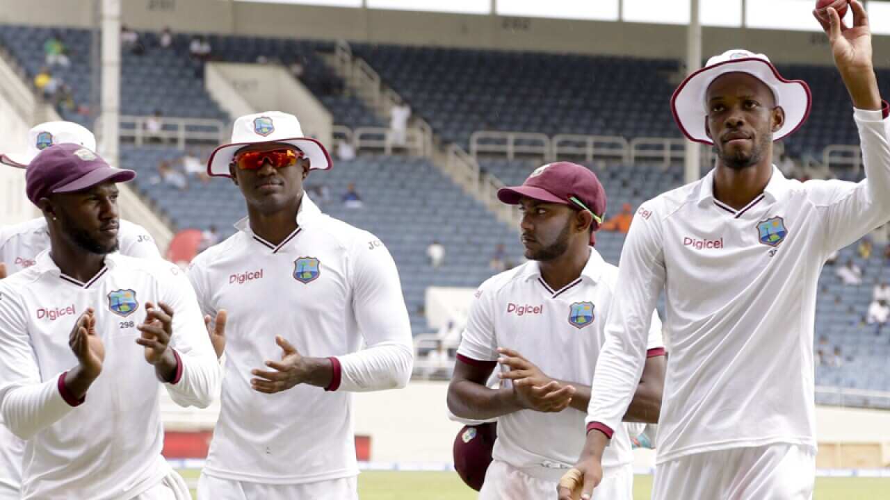 West Indies players walk off the pitch