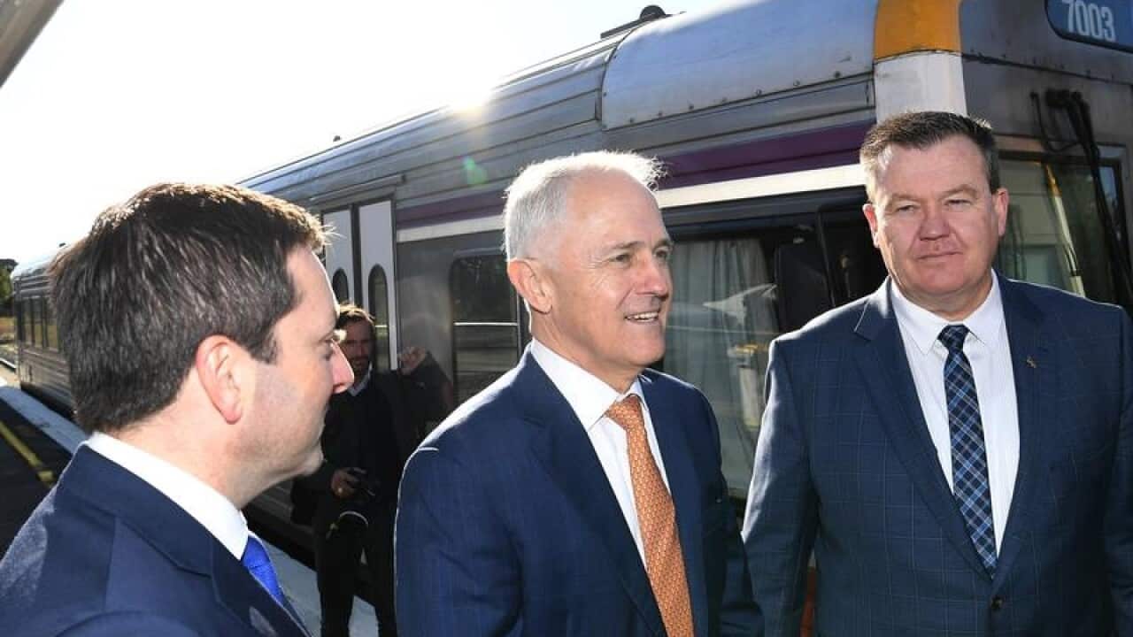 Victorian Opposition Leader Matthew Guy and Malcolm Turnbull (C)