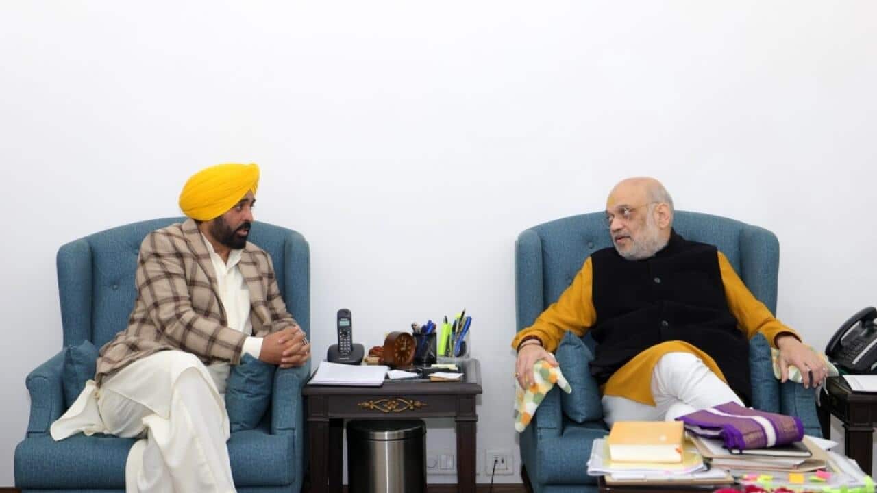 bhagwant mann & AMit Shah.jpg