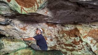 Shinatria Adhityatama working in the cave. Credit_ Supplied_Shinatria Adhityatama.jpg