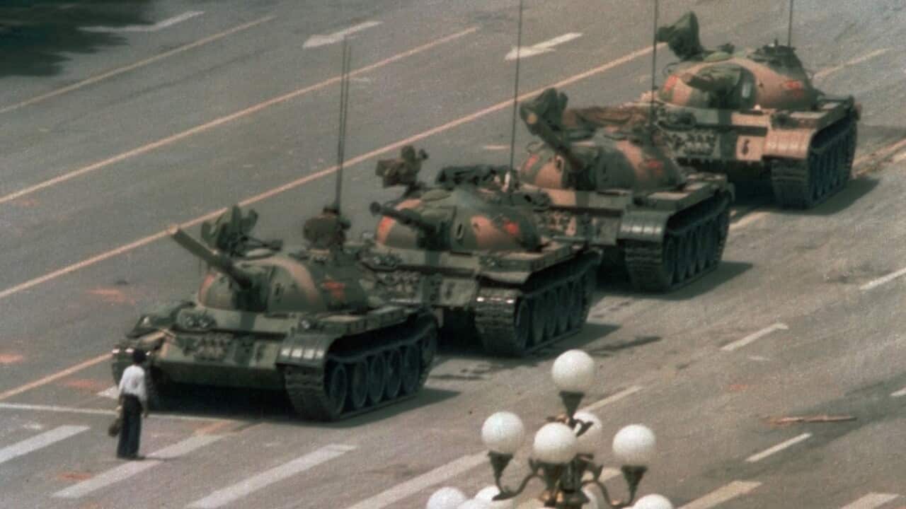 In this June 5, 1989 file photo, a Chinese man stands alone to block a line of tanks heading east on Beijing's Changan Blvd. 