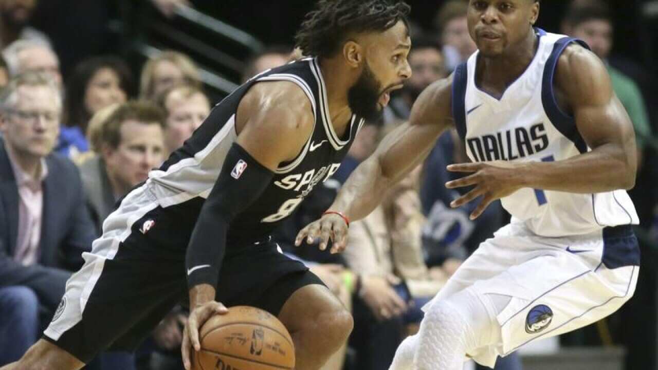 San Antonio Spurs guard Patty Mills in action