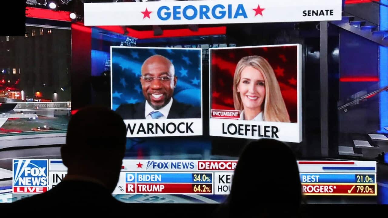 Senator Kelly Loeffler and Rev Raphael Warnock face off in heated debate in Georgia