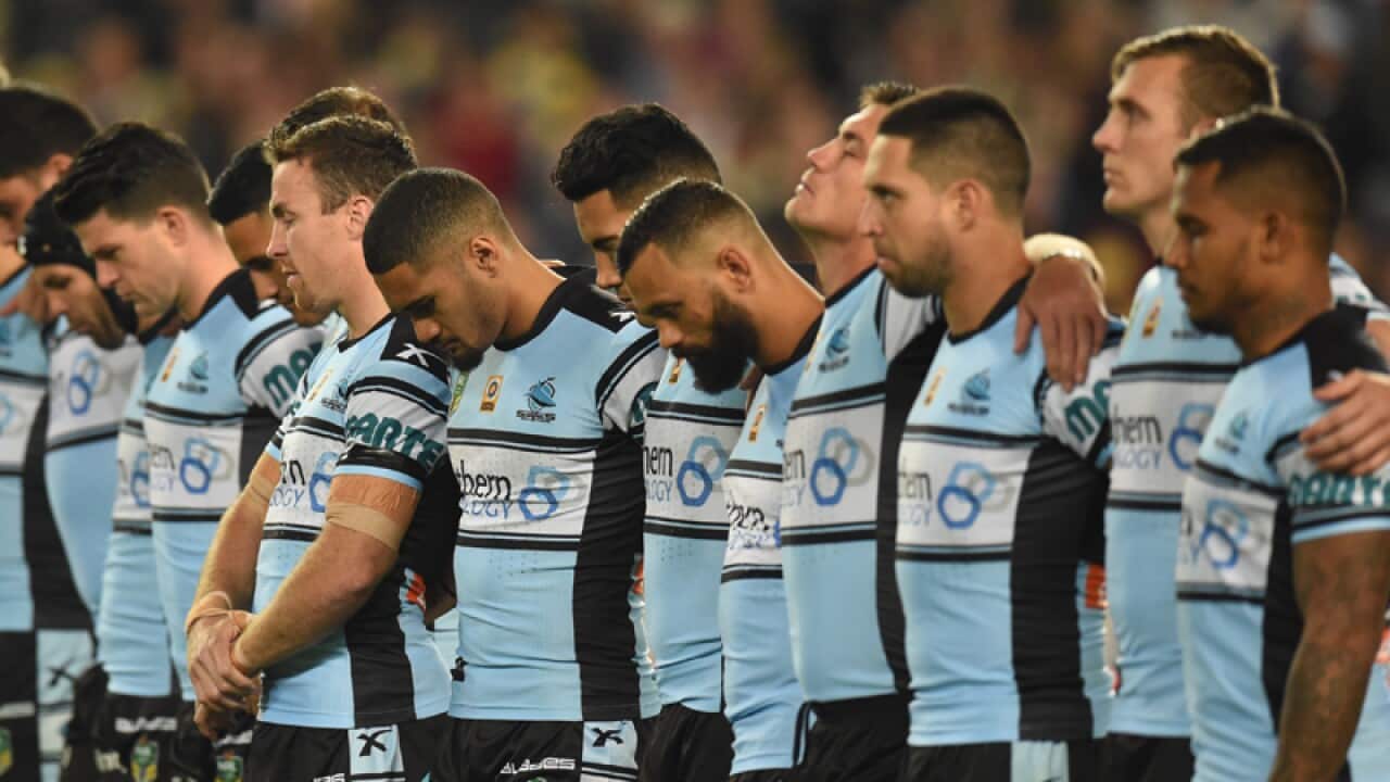 The Sharks bow their heads