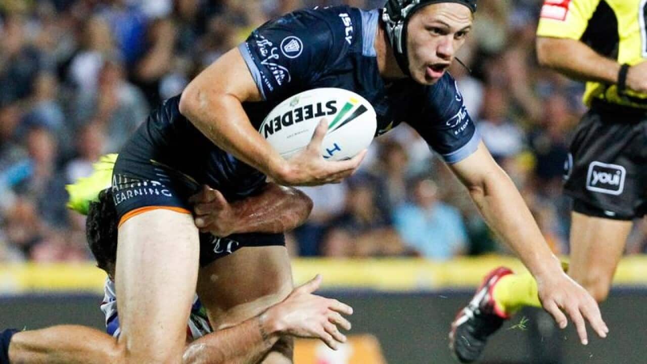 Kalyn Ponga is tackled during a game