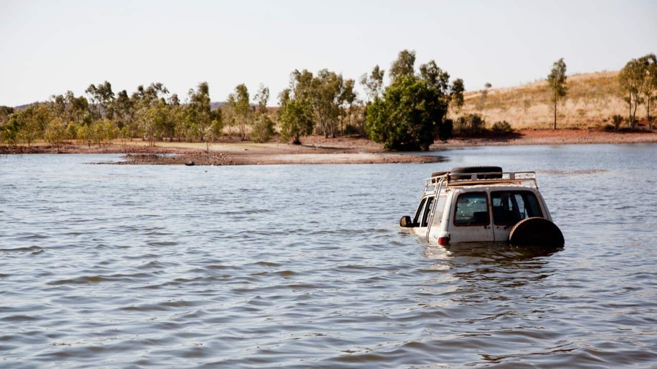 Driving 4X4 through deep water (Getty ImagesTobias Titz)