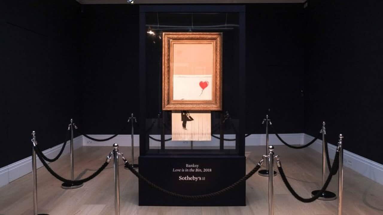 Banksy's artwork tilted Love is in the Bin - previously known as - Girl with Balloon at Sotheby's Auction House in London, UK on October 13, 2018. (Photo by Claire Doherty/Sipa USA).