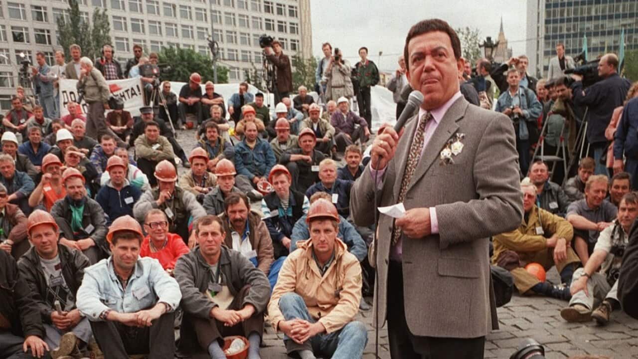 Member of the Parliament singer Iosif Kobzon sings during a free concert for the miners outside Russia's government building in Moscow, Friday, June 26, 1998.