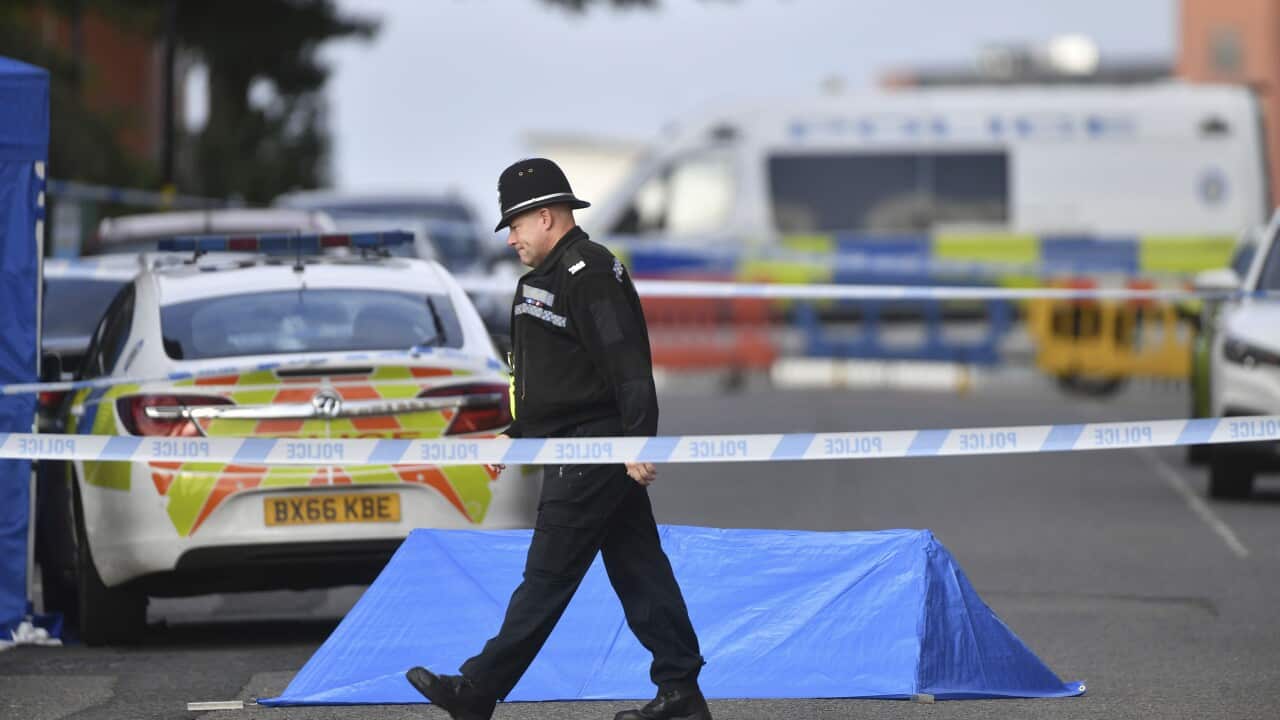 A police officer at a cordon in Irving Street in Birmingham after a number of people were stabbed in the city centre.