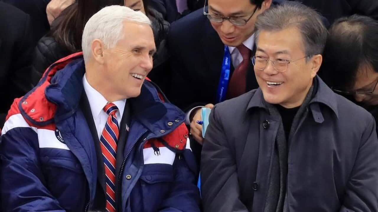 South Korean President Moon Jae-in and US Vice President Mike Pence at an Olympic skating event.