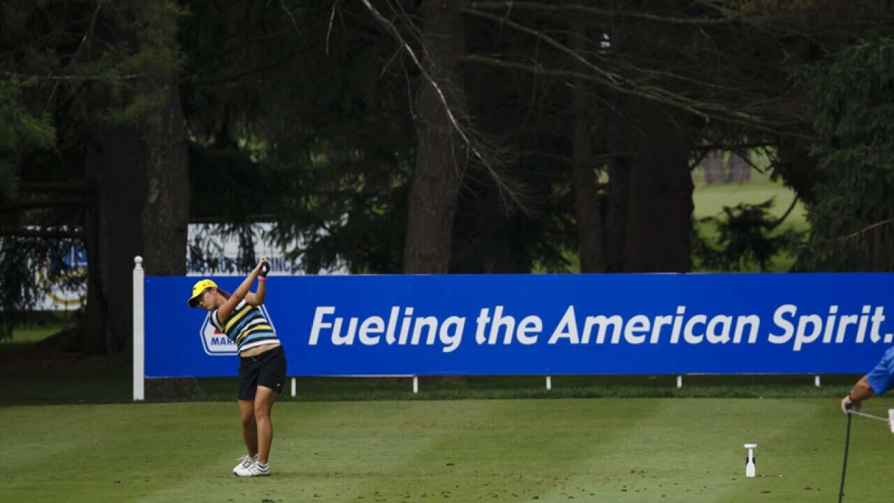 Lydia Ko, of New Zealand, tees off on the sixth hole