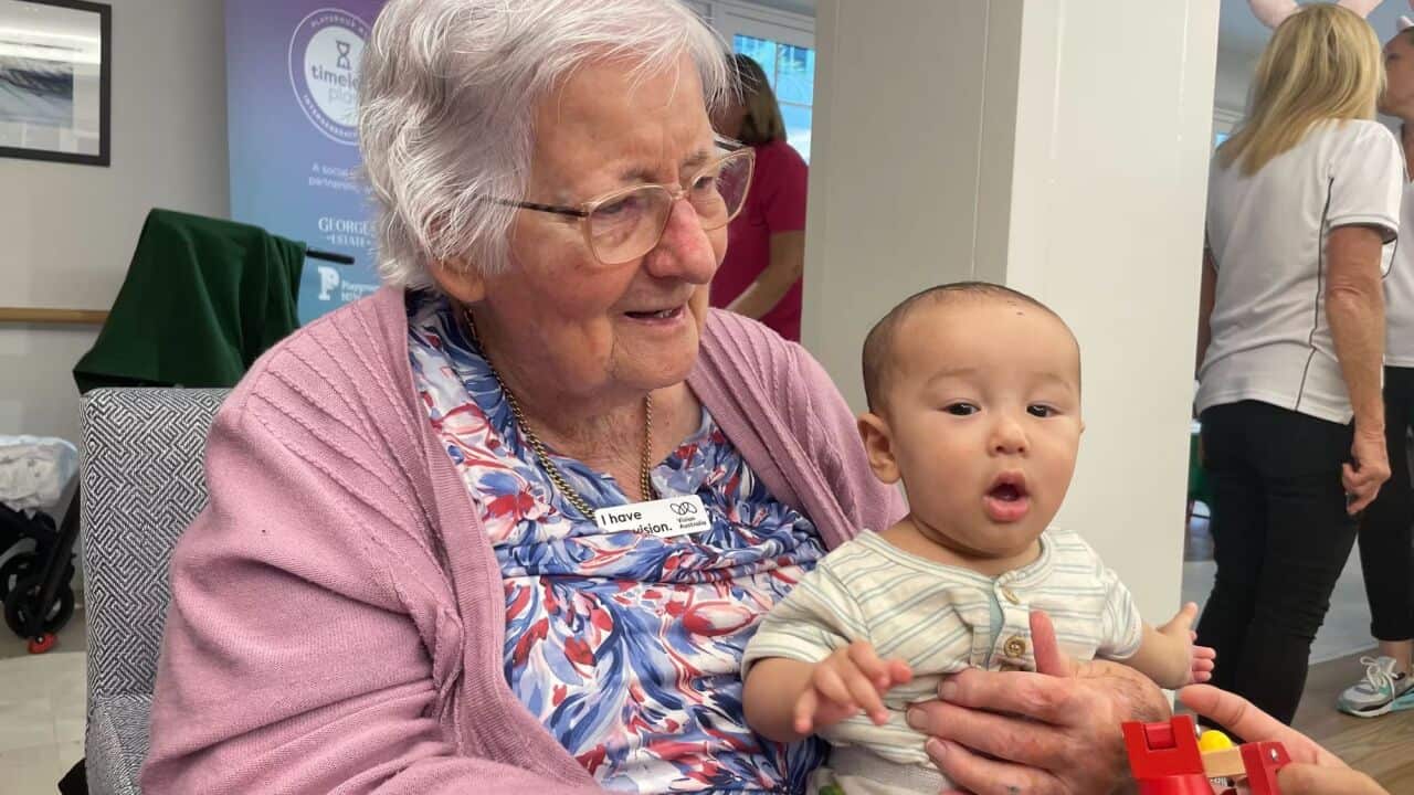 Carmel Bollard enjoys time with Charlie during a playgroup in Sydney's south_Rayne Tamer_SBS.jpg