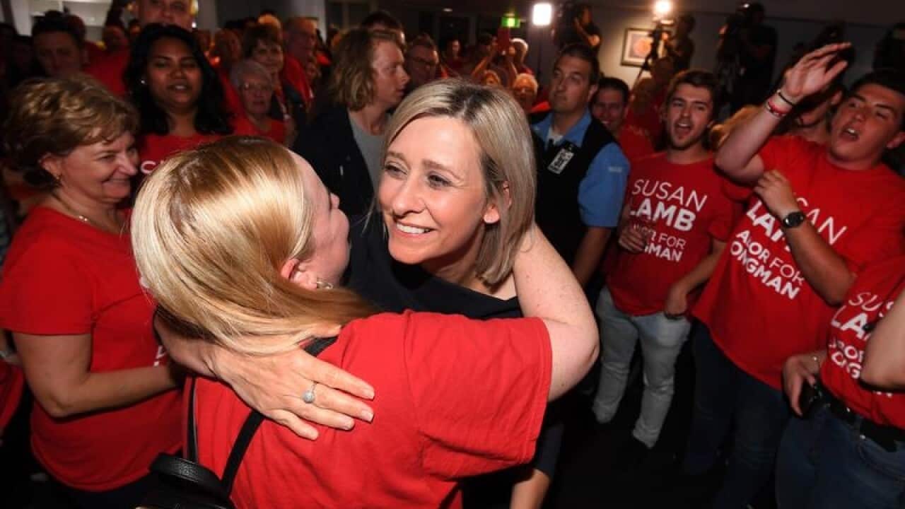 Labor's candidate for Longman Susan Lamb celebrates with supporters.