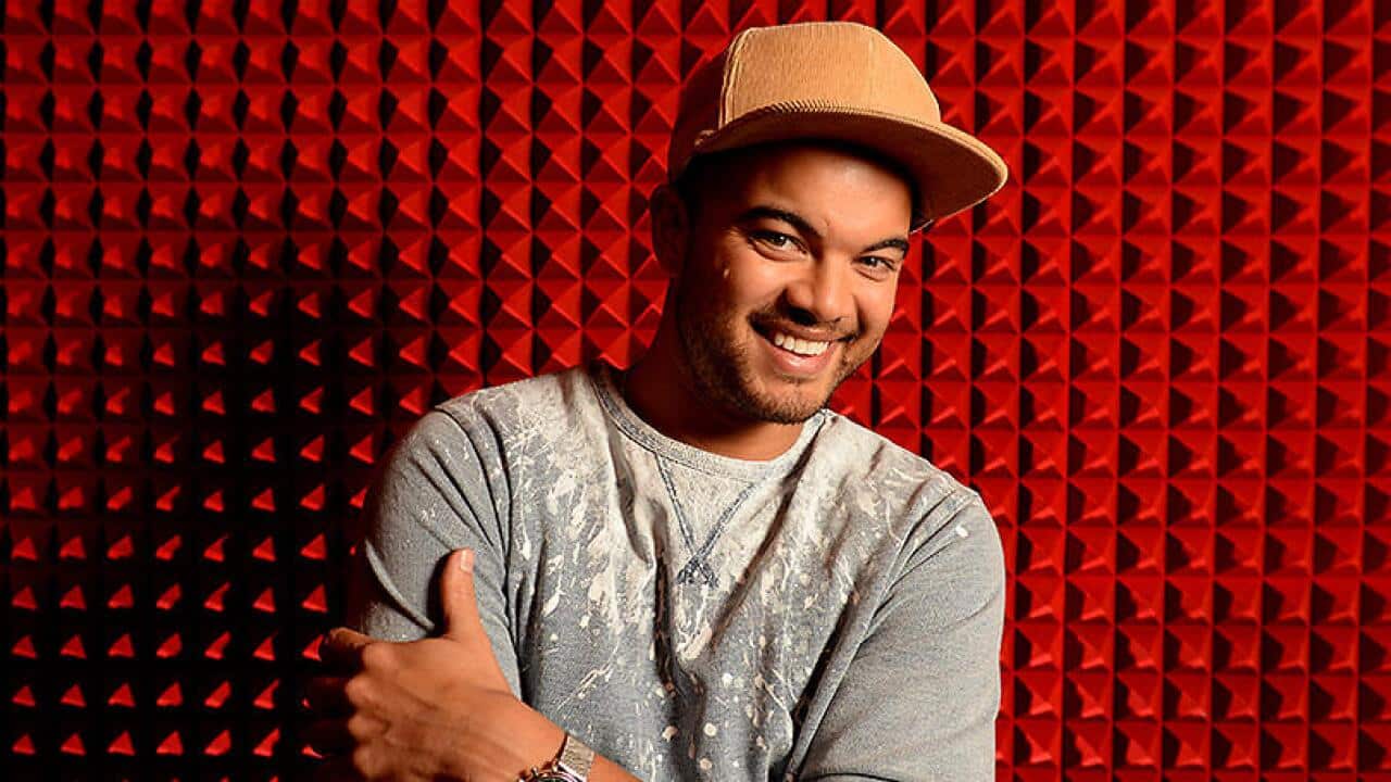 Australian singer Guy Sebastian poses for a photograph in Sydney, Wednesday, Aug. 13, 2014. Sebastian has released a new single titled 'Come Home With Me', and is embarking on an arena tour of Australia. (AAP Image/Dan Himbrechts) NO ARCHIVING