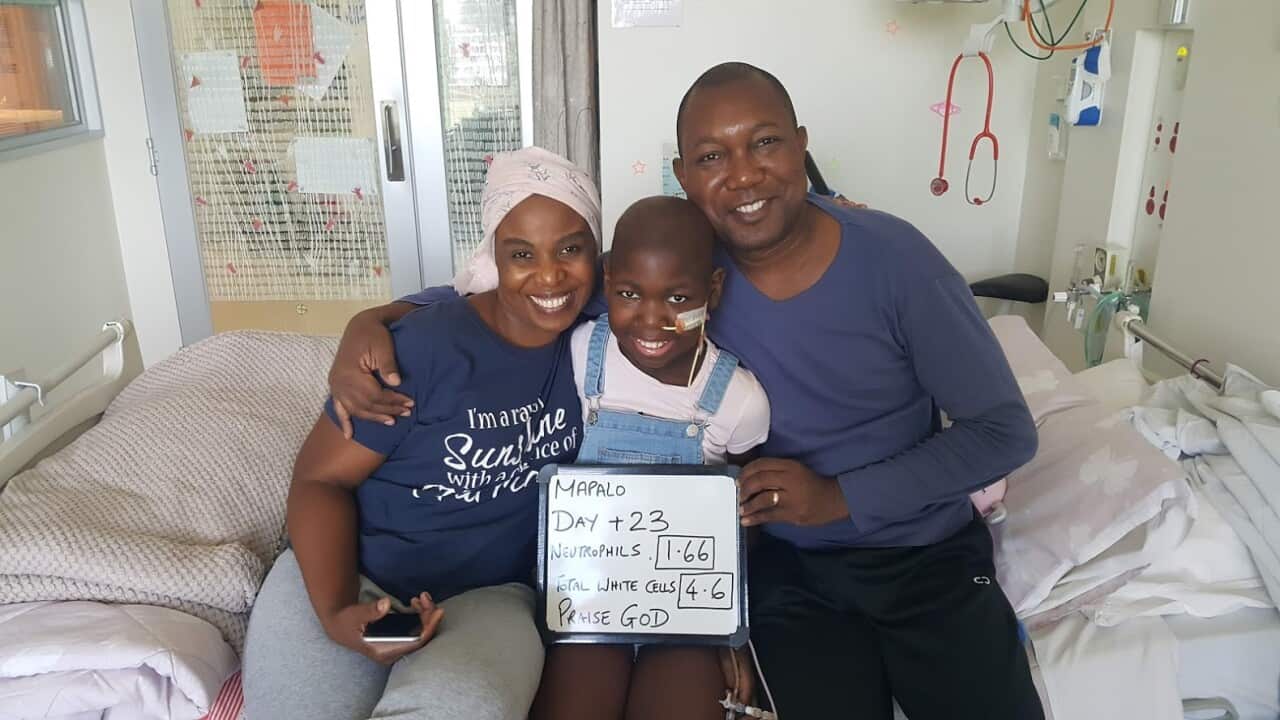 11-year-old sickle cell disease survivor Mapalo Joy with her mother Agnes and father Preston