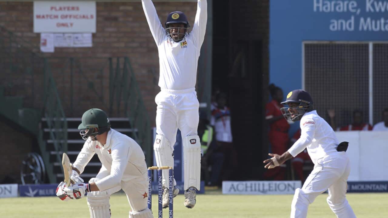 Sri Lanka wicketkeeper Kusal Janith Perera (C) appeals for a wicket