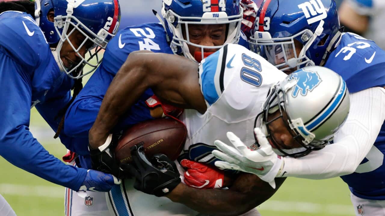 Detroit Lions wide receiver Anquan Boldin (C)