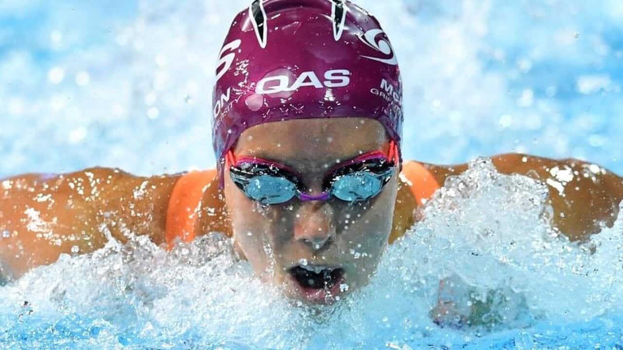 Emma McKeon in action winning the final of the 100 metre Butterfly.