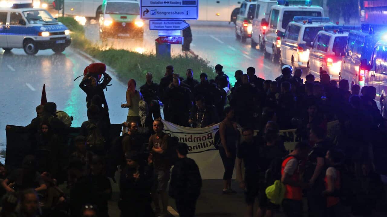 Protesters clash with police ahead of the G7 summit