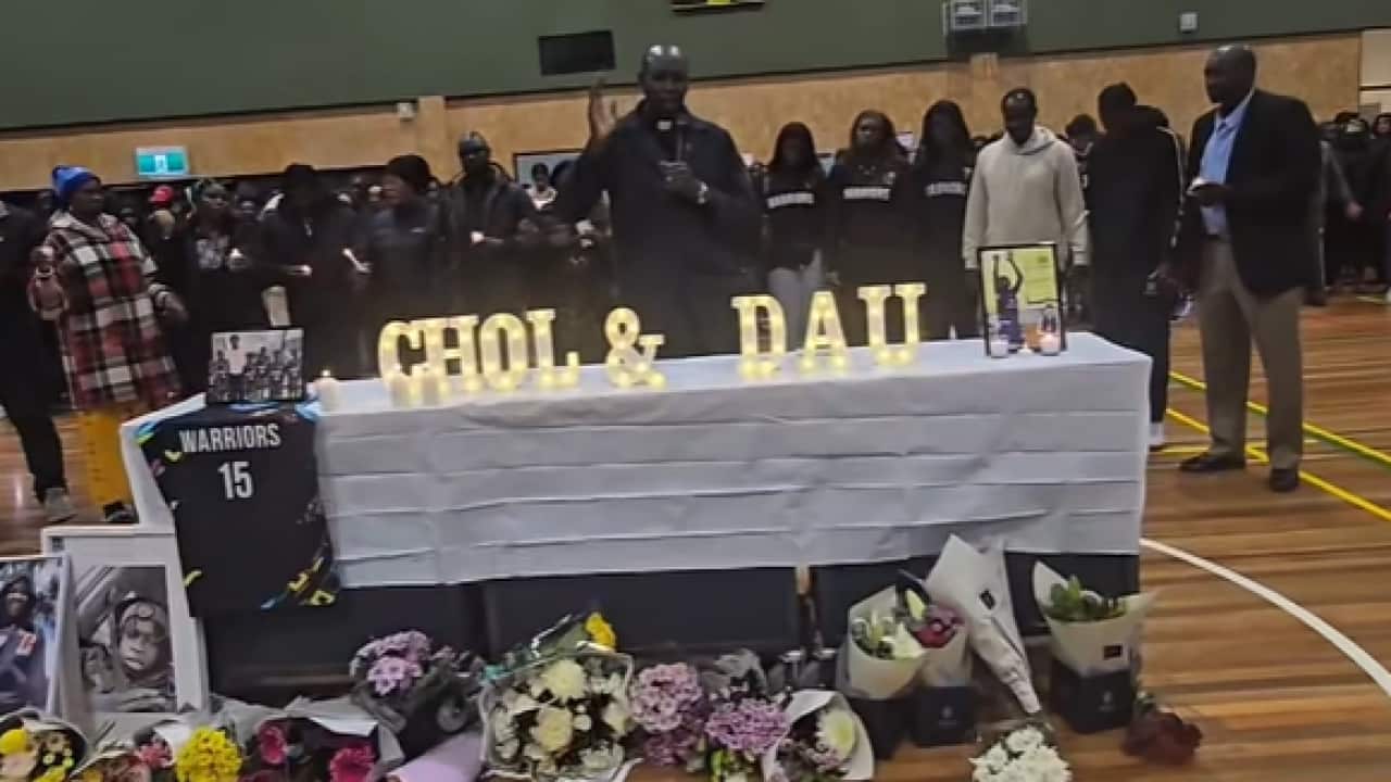 Candle light vigil for Chol & Dau