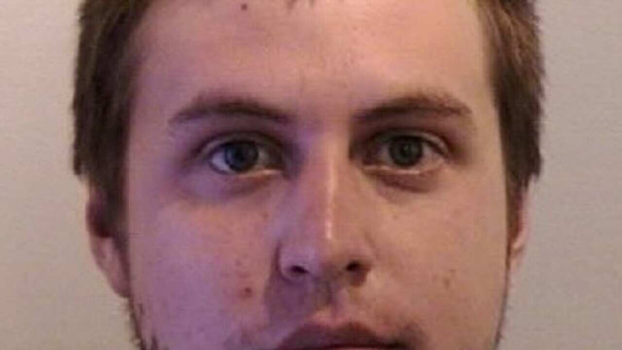 An image supplied by police of the accused