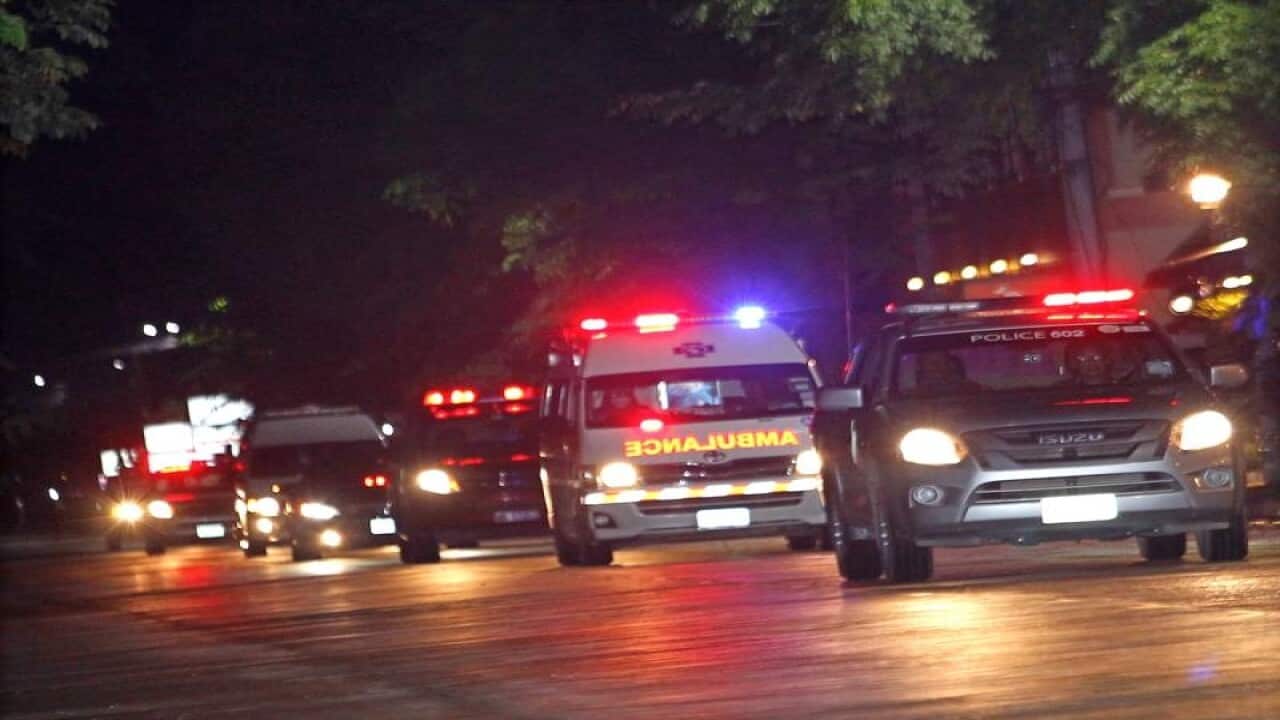 A convoy of ambulances taking the four rescued boys to hospital