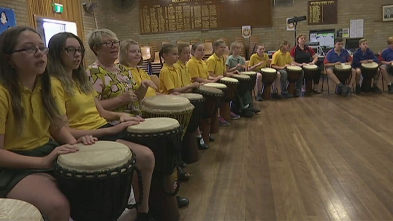 Students learning the drums in Goulburn