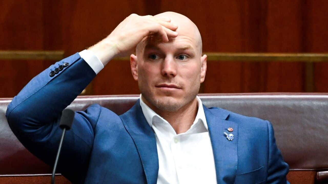 Independent Senator David Pocock reacts during debate in the Senate chamber at Parliament House in Canberra, Monday, November 21, 2022.