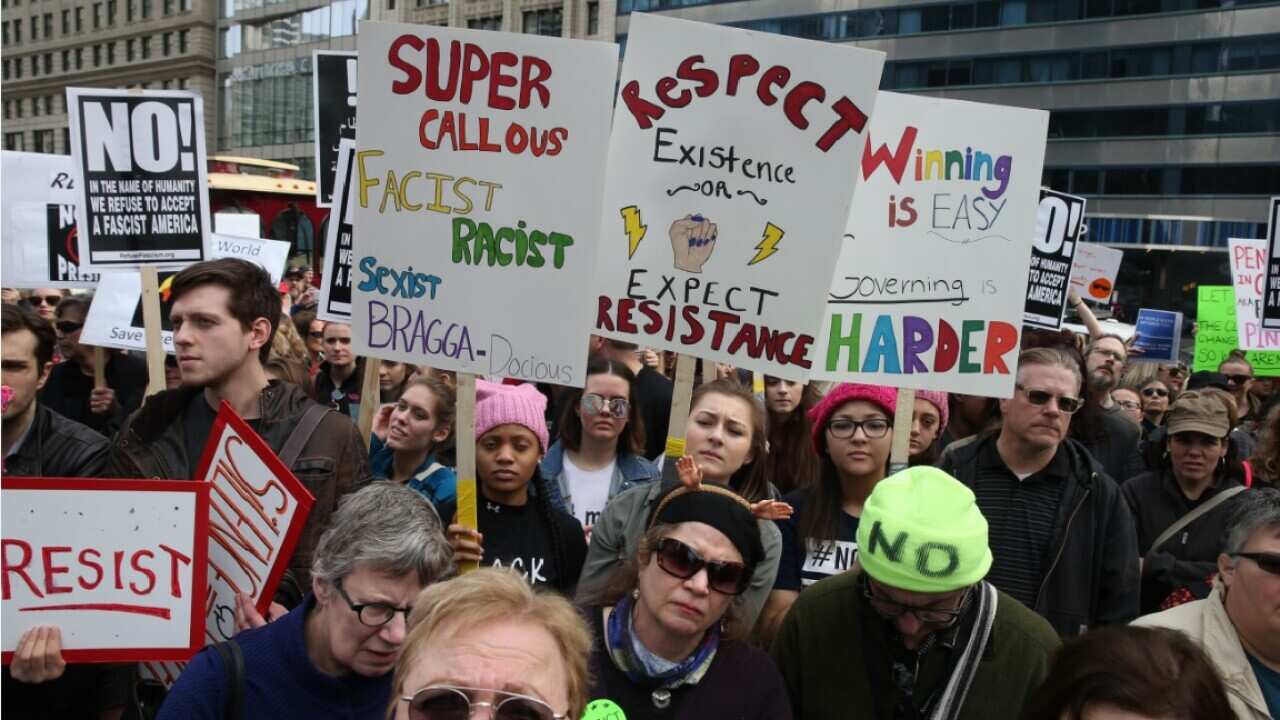 FILE: Thousands of anti-Trump protesters marched across the country as the nation celebrated its Presidents Day holiday