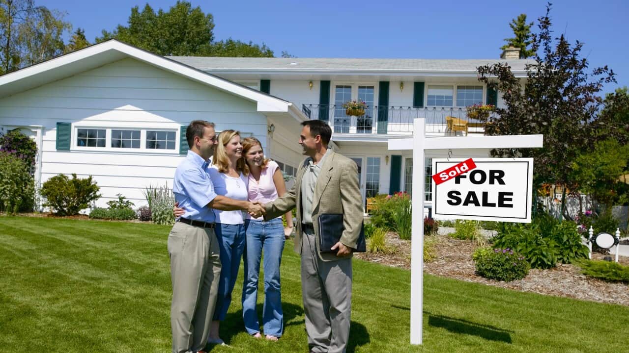 Real Estate Agent sells a house