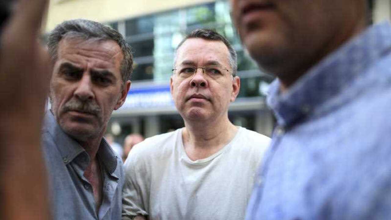 In this July 25, 2018 photo, Andrew Craig Brunson, an evangelical pastor from Black Mountain, North Carolina, arrives at his house in Izmir, Turkey.
