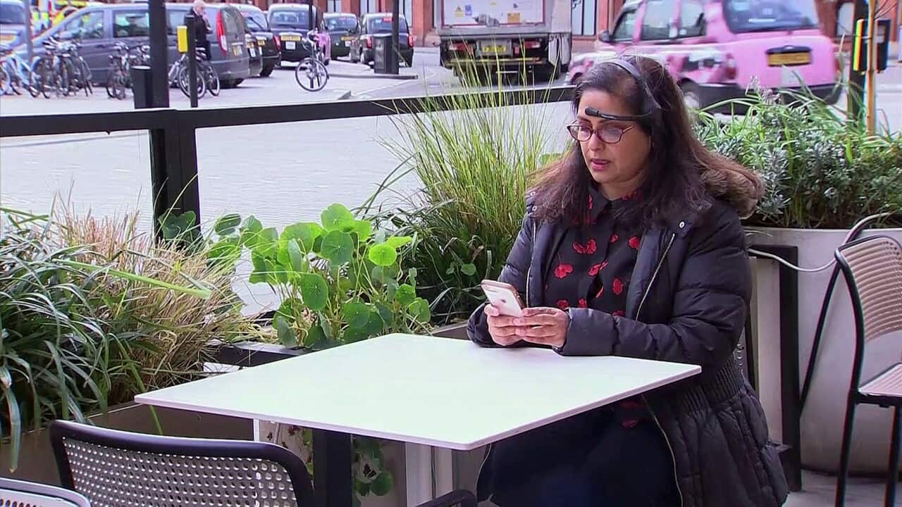 Shaheen Larrieux wearing a device that tracks her physical data