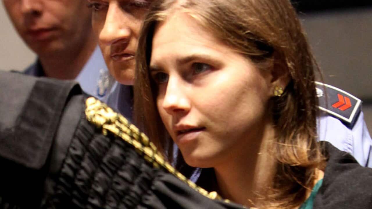 amanda_knox__verdict_success_0410_b_getty_1264593051