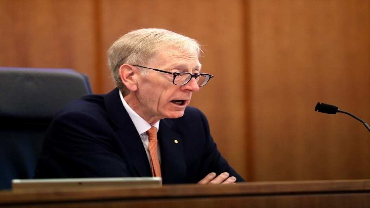 Commissioner Kenneth Hayne makes his opening statements.