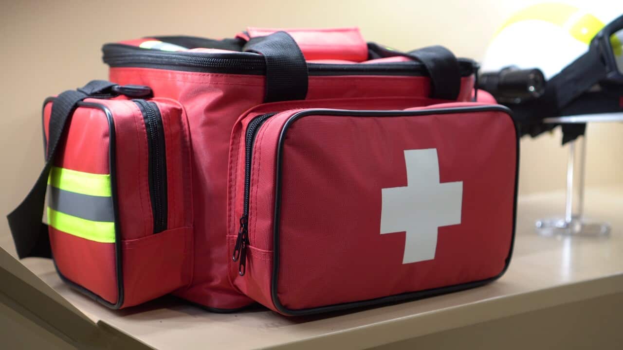 red-first-aid-equipment-emergency-bag-for-accident-disaster-SBI-350964882.jpg