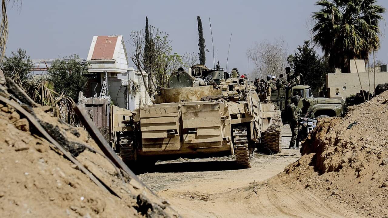 Syrian Arab Army armoured units advance during military operations against Jabhat al-Nusra terrorist organisation and affiliated groups in the Eastern Ghouta.