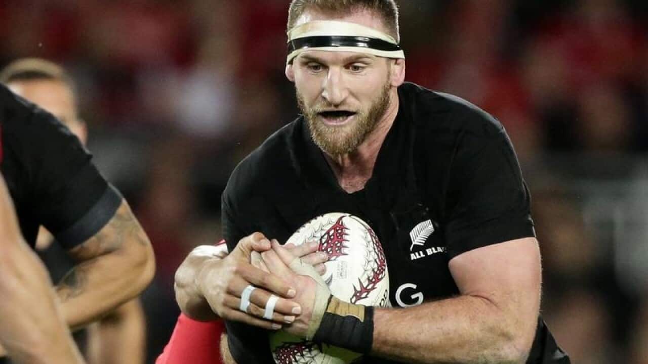 New Zealand captain Kieran Read runs at the defense