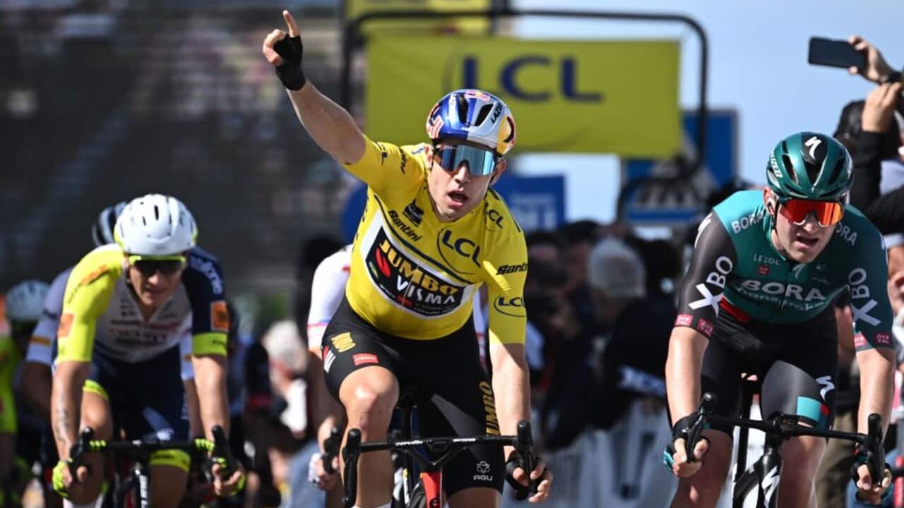 Wout van Aert (Jumbo-Visma) celebrates as he crosses the finish line
