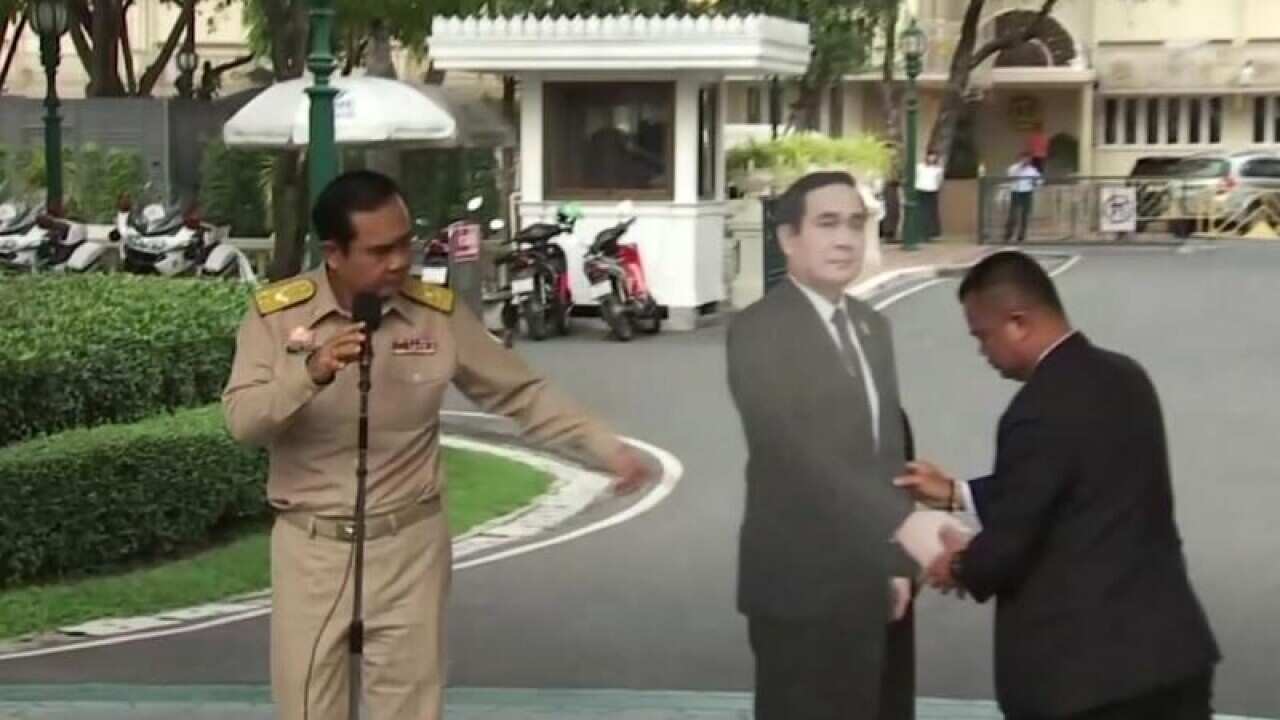 Thailand's PM Prayuth Chan-ocha with his cardboard cutout