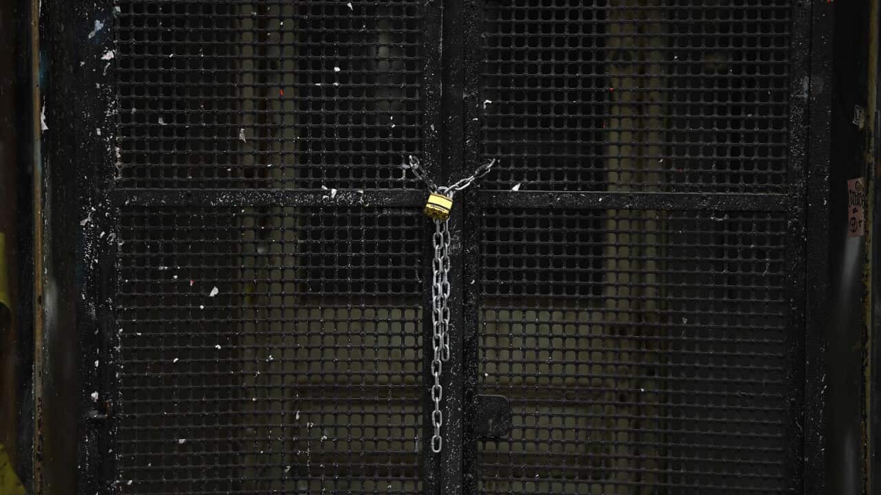 Shops and businesses are locked up within the central business district of Melbourne