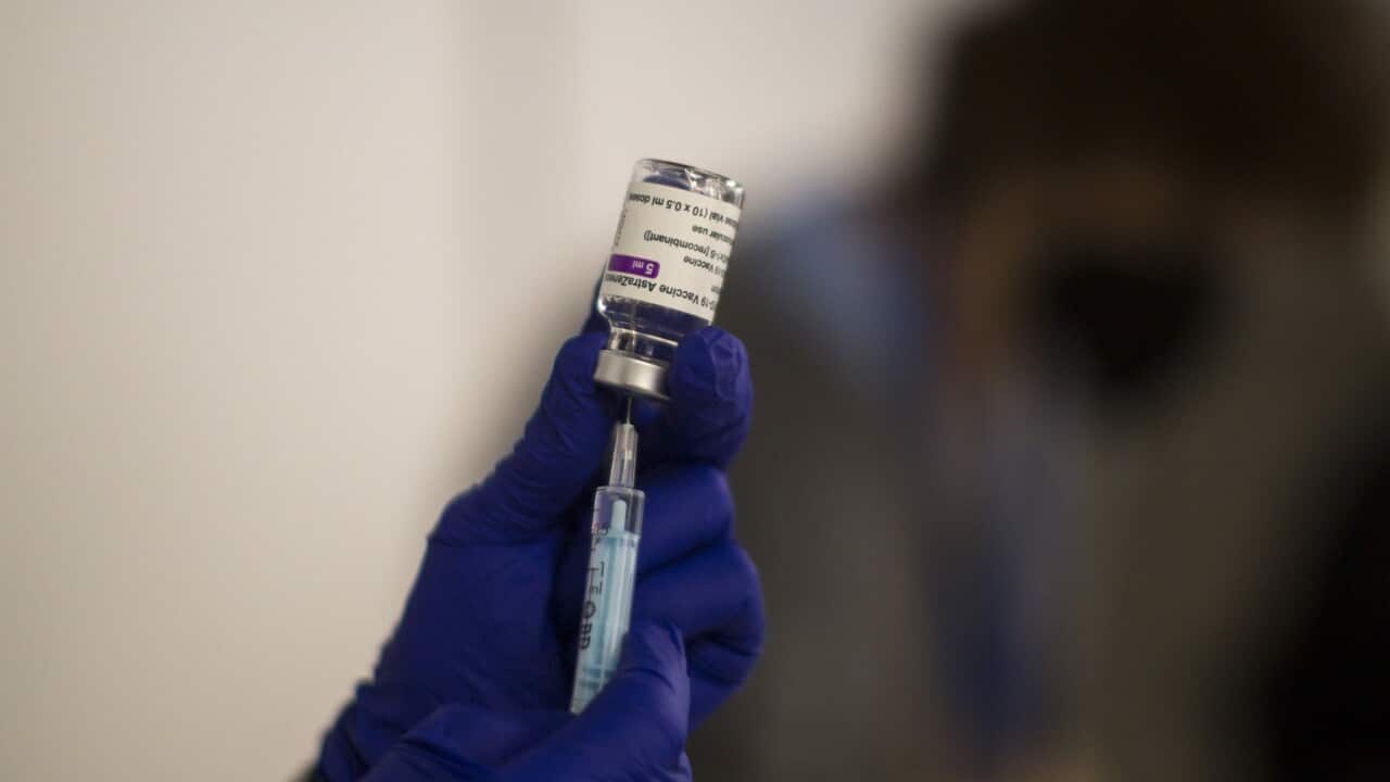A nurse prepares to administer a dose of AstraZeneca vaccine (AAP)