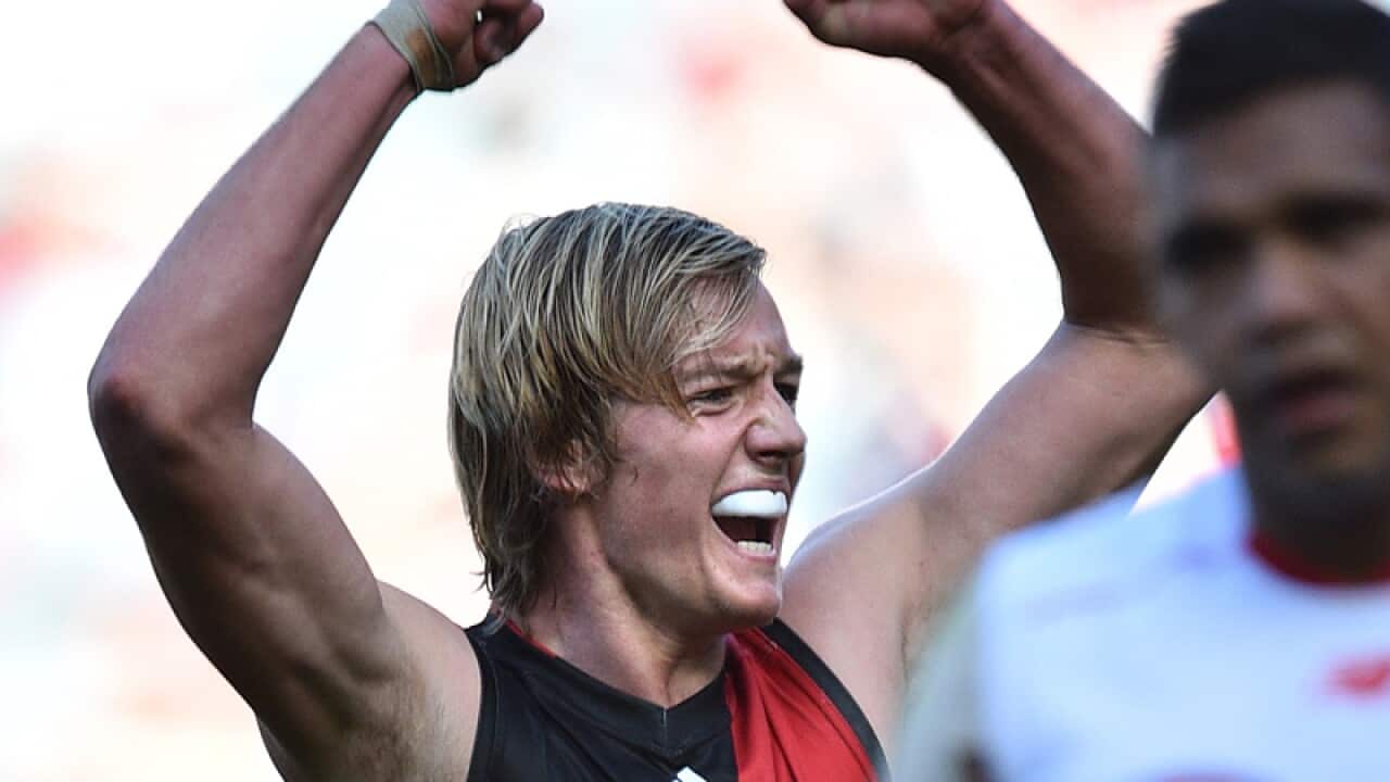 Essendon Bombers player Darcy Parish (left)