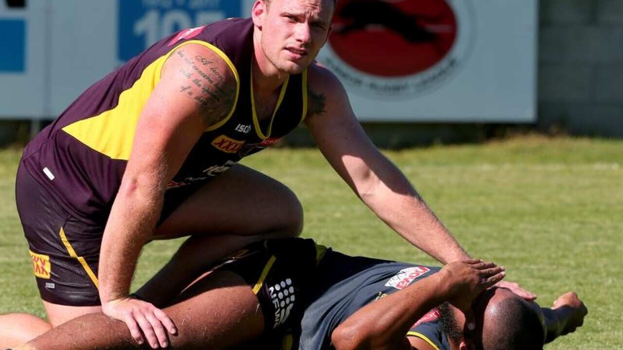A file image of Brisbane Broncos players Matt Lodge