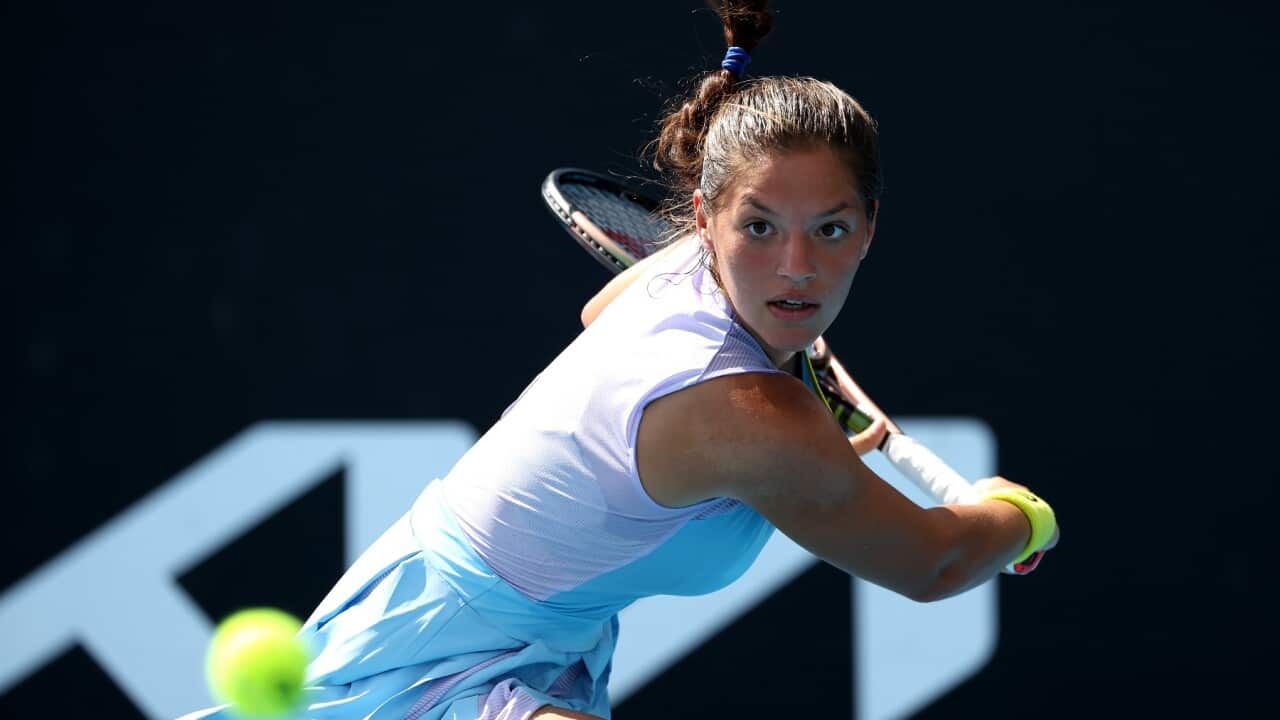 Michaela Laki of Greece plays a backhand in her Junior Girls Singles Quarterfinals match against Liv Hovde of USA during day 11 of the 2022 Australian Open.