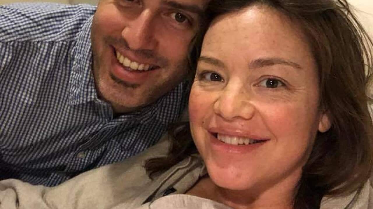 Julie Anne Genter pictured with her new baby and partner.