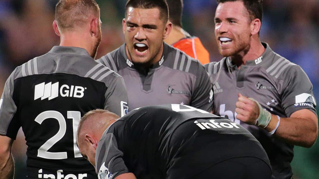Crusaders players celebrate